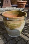 A large terracotta plant pot.