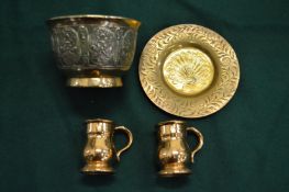 A small Eastern cast bronze bowl, engraved brass dish and pair of measures.