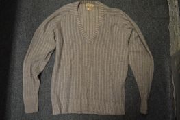 A collection of cashmere and other jumpers by Harrods and other makes.