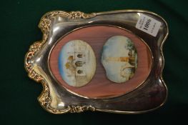 A frame mounted with two Indian miniatures.