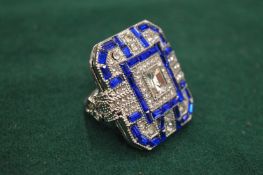 A very large faux sapphire and diamonte party ring.