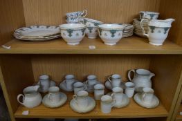 A Staffordshire part tea service and a Royal Doulton Berkshire part coffee service.