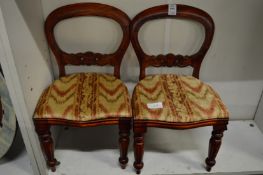 A pair of Victorian style miniature chairs (one leg damaged).