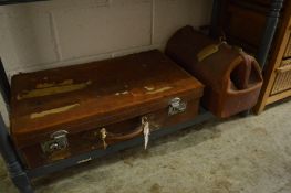 An old suitcase and a doctors bag.