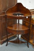 A George III mahogany corner wash stand.
