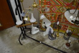 Four stylish light fittings.