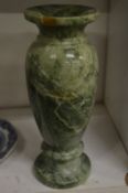A green marble vase.