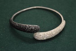 A decorative bangle.