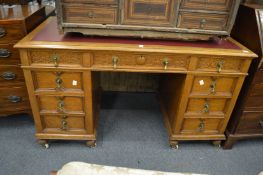 Waring and Gillow, a good oak pedestal desk, stamped and labelled.