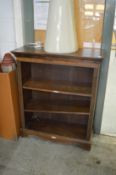 An oak open bookcase.