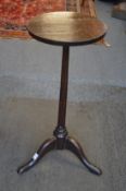 An early primitive oak tripod candle stand.