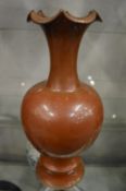 An unusual Chinese iridescent red glazed vase.