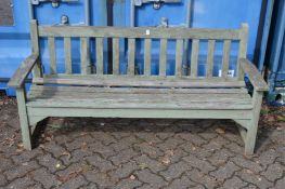 A painted wooden garden bench.