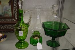 A green glass ewer and two other items.