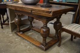 An old oak refectory style draw leaf dining table (faults).