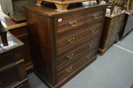 An Edwardian mahogany chest of drawers.