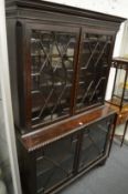 A good Chippendale revival mahogany four door standing bookcase.
