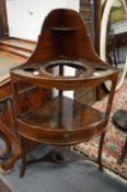 A George III mahogany corner wash stand.