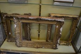 Three gilt picture frames, rebate sizes 65cm x 40cm, 40cm x 30cm, 52cm x 41cm (faults).