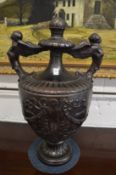 A large and impressive bronzed pottery twin handled urn.