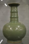 A Chinese celadon glazed bottle vase.