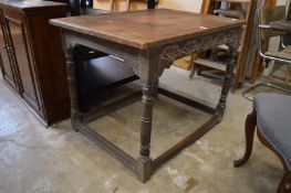 An oak occasional table.