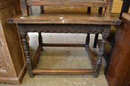 An oak occasional table.