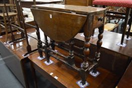 An 18th century and later oak drop-leaf gateleg table.