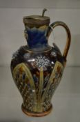 A good Doulton Lambeth jug with plated lid, the body mounted with stylised floral decoration and