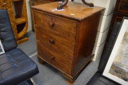 A mahogany three drawer chest.