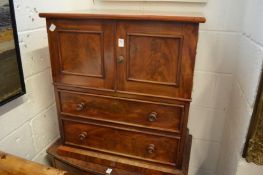 A 19th century mahogany commode.