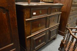 An 18th century oak three drawer chest.