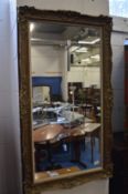 Decorative gilt framed mirror.