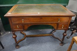 A mahogany writing desk.