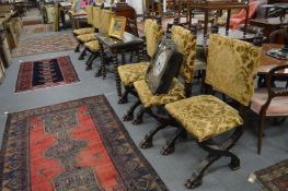 An unusual set of six 19th century Italian dining chairs with upholstered backs and seats, the X
