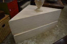 A pair of marble corner tables.