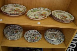 Spode and Davenport plates and dishes decorated with exotic birds.