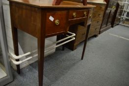 A mahogany bow front three drawer side table.