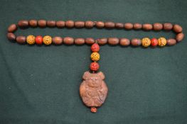 Chinese necklace with Buddha pendant.