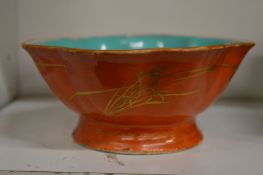 A Chinese iron glazed petal form pedestal bowl.