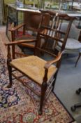 A good matched set of 19th century ash spindle back dining chairs with rush seats, two with arms.