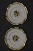 A pair of Davenport floral decorated cabinet plates (one cracked).
