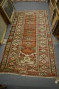 A Turkish carpet, 210cm x 110cm.