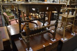 An 18th century oak side table.