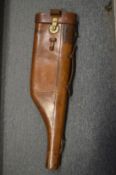 A leather leg of mutton gun case.