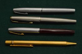 Four pens.