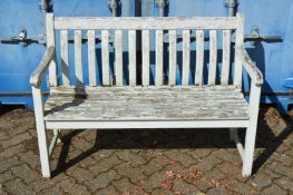 A painted wooden garden bench.