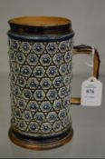 A good Doulton Lambeth jug with stylised moulded decoration.