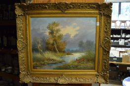 An oil painting depicting pheasants by a river and a decorative gilt frame.