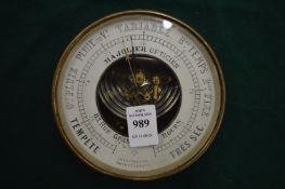 Brass cased barometer.